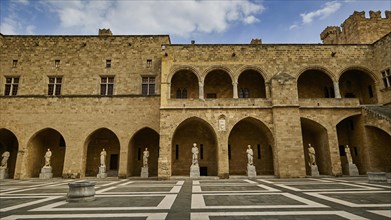 Super wide angle shot, castle courtyard with arcades, statues and a chequered floor under a cloudy