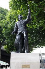 Monument to the actor Laurence Olivier on Queens Walk by the Thames, London England, Great Britain