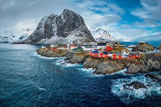 Hamnoy fishing village with red rorbu houses in Norwegian fjord in winter. Lofoten Islands, Norway,