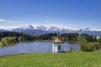 Chapel at Hegratsrieder See near Fuessen, Allgaeu Alps, snow, forest, Ostallgaeu, Allgaeu, Bavaria,