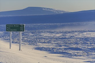 Road sign on the Dalton Highway in winter, Alaska, USA, North America