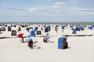 Beach chairs on the sandy beach, Harlesiel, Carolinensiel, East Frisia, Lower Saxony, Germany,