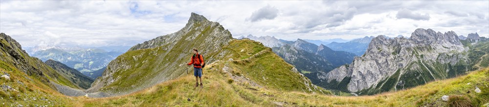 Panorama, mountaineer on Schoenjochl, mountain landscape on mountain ridge with green meadows,