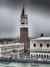 A view of the Campanile and St Mark's Square in Venice, with gondolas and historic buildings on a