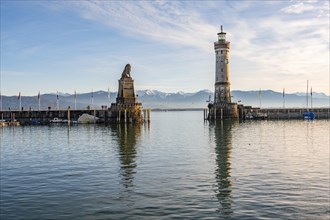 Harbour entrance of Lindau harbour, pier with New Lindau Lighthouse and Bavarian Lion, in the