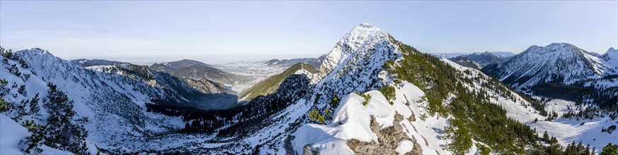 Panorama, mountain ridge of the Aiplspitz with summit cross, snow-covered mountain landscape with