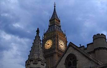 Big Ben, clock tower and clock, in front of Westminster Hall at dusk, Bridge Street, SW1 London,