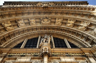 Decorative entrance portal seen from below from the Victoria & Albert Museum, 1-5 Exhibition Rd,