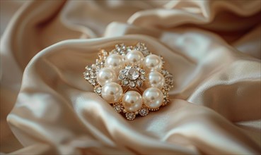 A pearl brooch adorned with sparkling crystals resting on a smooth satin material background AI
