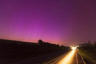 Northern lights in southern Germany. Very strong auroras over the A8 motorway near Aichelberg,