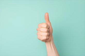 Woman's hand showing thumbs up sign. KI generiert, generiert, AI generated