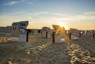 Beach chairs and Wadden Sea, sunset, Duhnen, Cuxhaven, North Sea, Lower Saxony, Germany, Europe