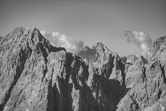 Spectacular rocky mountain peaks of the Sesto Dolomites, black and white, view from the Carnic Main