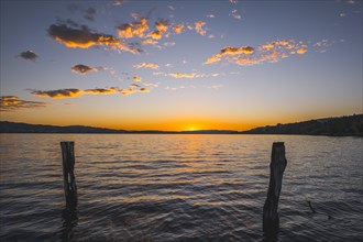 Sunset over Lake Sempach with glowing clouds, Sempach, Lucerne, Switzerland, Europe