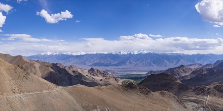 Panorama from the Khardong Pass, the second highest motorway pass in the world, over Leh and the