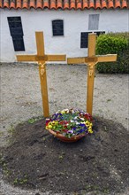 Simple grave with two crosses near the cemetery church of St Stephan, Irsee, Swabia, Bavaria,