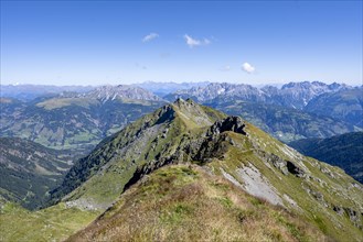 Grassy mountain ridge and view of the Lesach Valley, mountain panorama, Carnic High Trail, Carnic