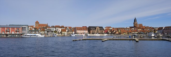 Town panorama with town harbour on Lake Mueritz, St. Georgen Church and St. Marien Church, Waren,