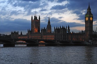 Palace of Westminster at dusk, on the River Thames, London, England, Great Britain