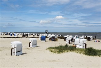 Beach chairs on the sandy beach, Harlesiel, Carolinensiel, East Frisia, Lower Saxony, Germany,