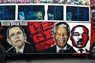 Decorated public transport called matatu, portraits of political leaders, Barack Obama, Nelson