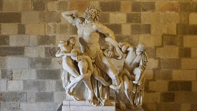 Copy of the Laocoon Group, Dynamic sculpture of a mythological battle scene with several figures,