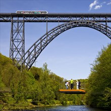 Muengsten Bridge with diesel railcar and transporter bridge over the Wupper, Solingen, Bergisches