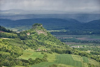 View from the Hohentwiel fortress ruins to the neighbouring Hohenkraehen, with the Witthoh mountain