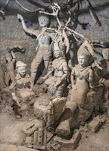 Statues inside the Jaws of Hell structure at Xieng Khuan Buddha Park, Vientiane, Laos, Asia