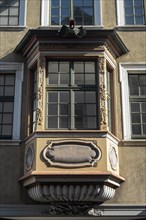 Historic house facade and decorated bay window in the old town of Schaffhausen, Canton of