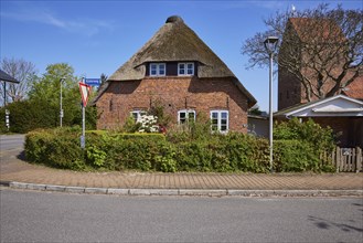 Side view of a Frisian house in Niebuell, Nordfriesland district, Schleswig-Holstein, Germany,