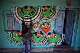 Purulia Chhau dance masks on sale, shop selling traditional crafts, West Bengal, India, Asia
