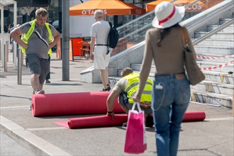 Cannes, France, 13 May 2024: A red carpet is rolled out at Cannes train station. The 77th Cannes