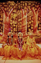 Actors impersonating hindu deities, Lakshmana on the left, Rama in the middle, Sita on the right,