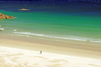 A single person on a wide sandy beach, holiday, Durness, Highlands, Scotland, Great Britain