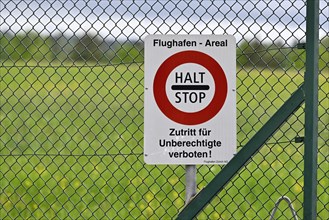 Warning sign Halt Stop airport area