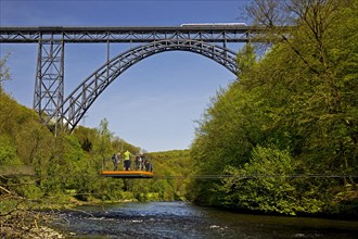 Muengsten Bridge with diesel railcar and transporter bridge over the Wupper, Solingen, Bergisches