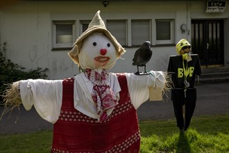 Scarecrows at the parish hall of the Protestant church in Unterburg, Solingen, Bergisches Land,