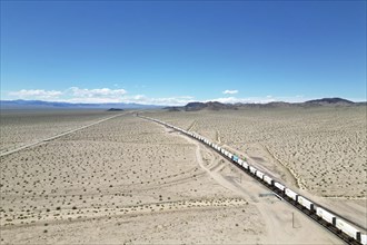 Drone shot of Route 66 with railway, Mojave Desert, California