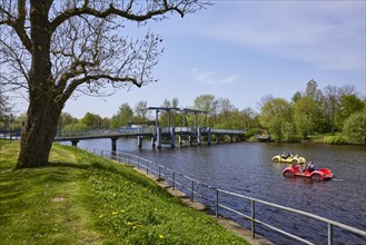 Bascule bridge labelled Blue Bridge and car-shaped pedal boats on the Westersielzug in