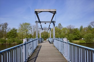 Blue bridge over the Westersielzug in Friedrichstadt, district of Nordfriesland,