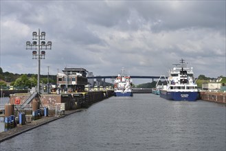 Cargo ships in the Kiel-Holtenau lock, Schleswig-Holstein, Germany, Europe