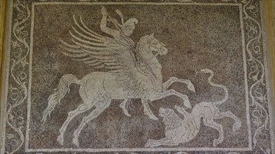 Ancient mosaic with Bellerophon on horse Pegasus fighting a chimera, showing mythological scenes,