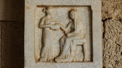 Funerary stele from Obastis, Diphros, Alabastron, seated deceased woman and standing servant, A