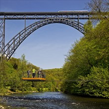 Muengsten Bridge with diesel railcar and transporter bridge over the Wupper, Solingen, Bergisches