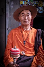 Portrait of elderly tibetan man, Chengdu, Sichuan, China, Asia