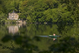 Seeschloesschen with rowing boat on the Hengsteysee, Herdecke, North Rhine-Westphalia, Germany,