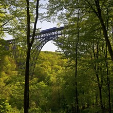 View from the forest to the Muengsten Bridge with railway, the highest railway bridge in Germany