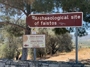 Tourist sign on archaeological site of Phaistos Palace excavation site of Minoan culture of