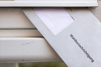 A letter for the voter's notification for the European elections in a letterbox in Berlin, 14 May